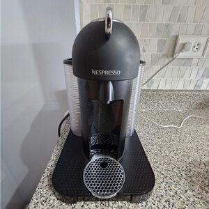 Nespresso Black and Silver Coffee Maker